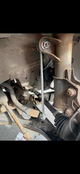 New rear suspension link — torqued to specification